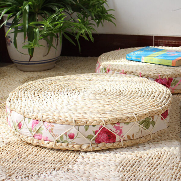 Coussin circulaire avec des roses