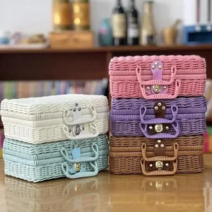 Coffre jouet style valise en rotin synthétique