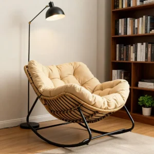 Fauteuil à bascule en rotin avec coussin et armature métal