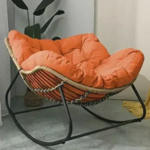 Fauteuil à bascule nid d'oiseau en rotin tissé